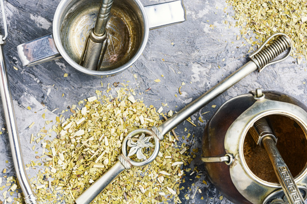 Yerba mate tea popular in latin america.Yerba mate in calabash and dry herb.